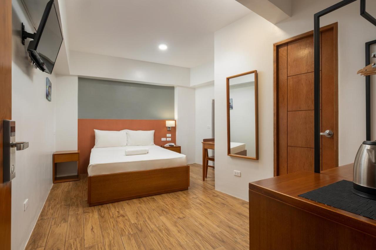 Ihotel Uptown Bgc Тагиг Экстерьер фото